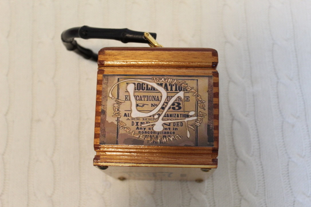 Design on each side of the Harry Potter cigar box purse