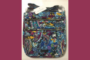 Review of the Vera Bradley hipster bag with Mickey and Minnie Mouse designs on it