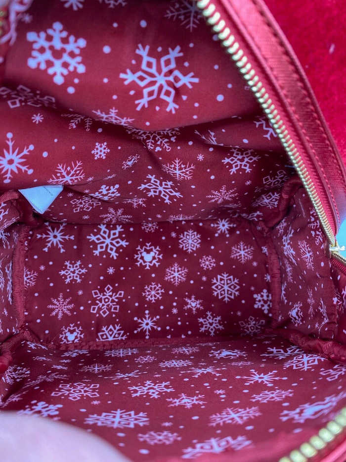 Inside lining of the Loungefly Santa Mickey Mini Backpack