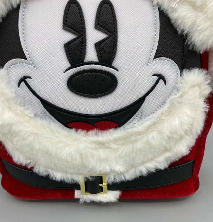 Textures of the Loungefly Santa Mickey Mini Backpack