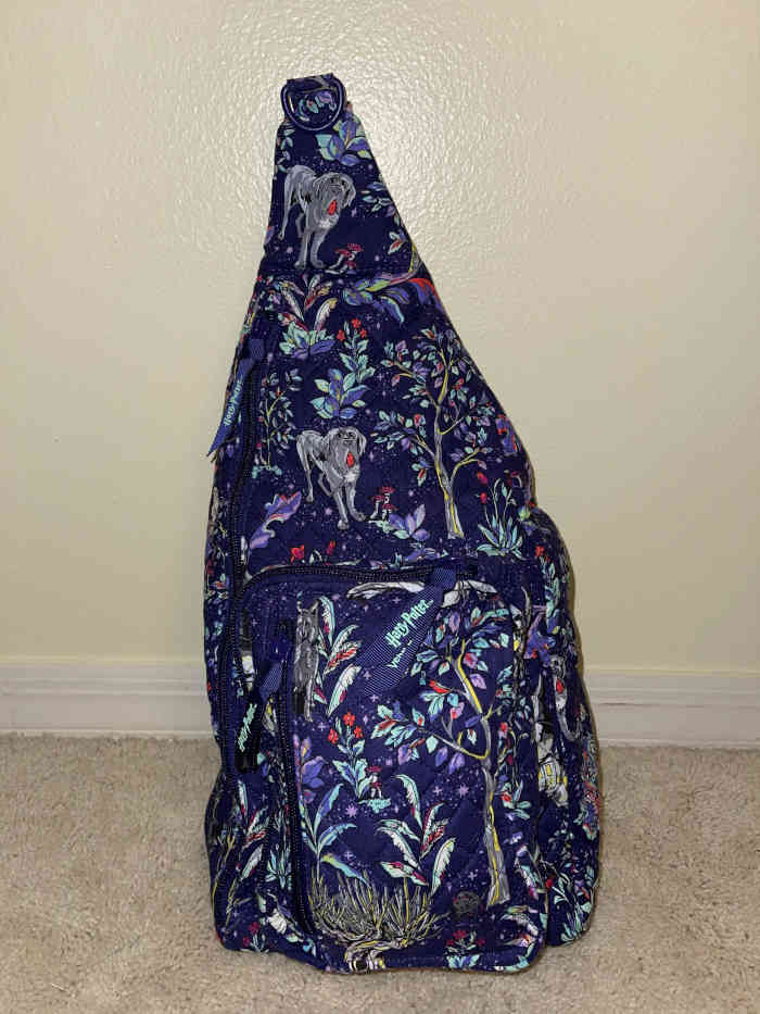 Front vew of my Vera Bradley Forbidden Forest sling backpack packed with stuff